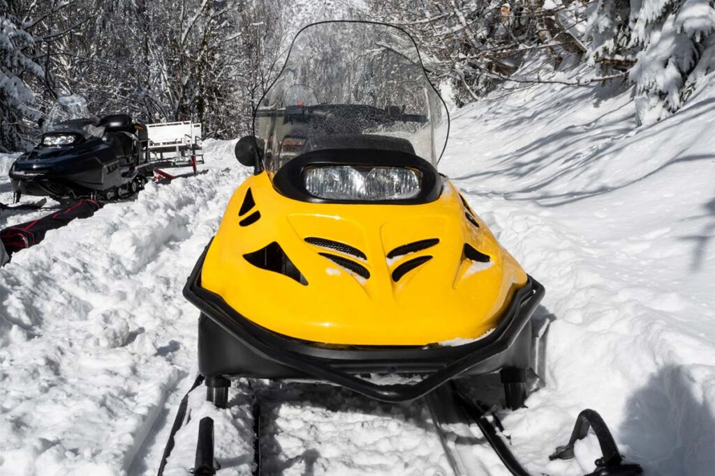 Front View of Yellow Snowmobile