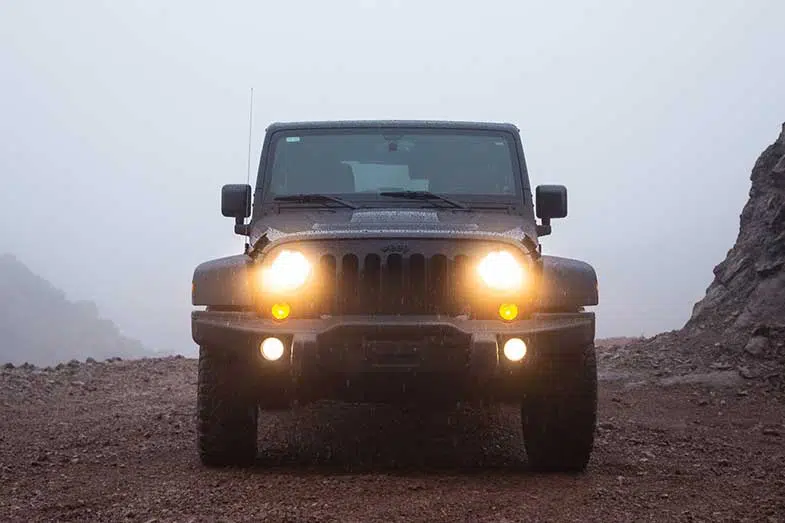 Black Jeep Wrangler in the Rain