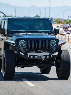 Black Jeep Wrangler on the Road