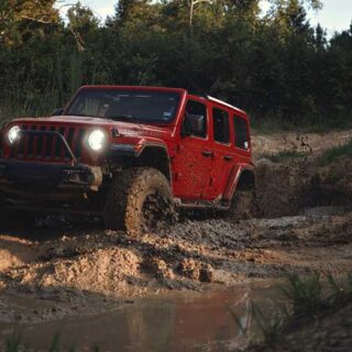 Red Jeep Off-Road Mud