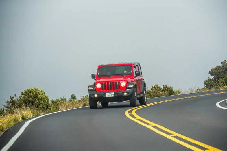 Red Jeep Wrangler on Road