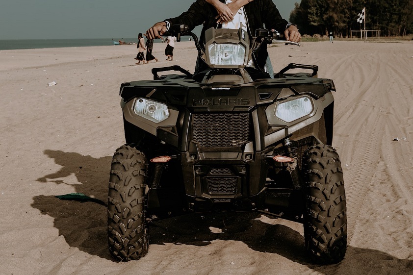 Polaris Sportsman ATV on a Sandy Beach