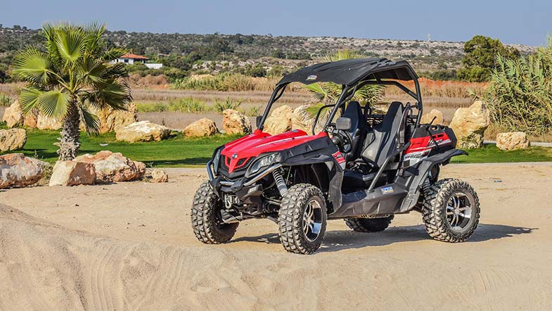 Red CFMOTO 800 Off-Road Buggy on Sand