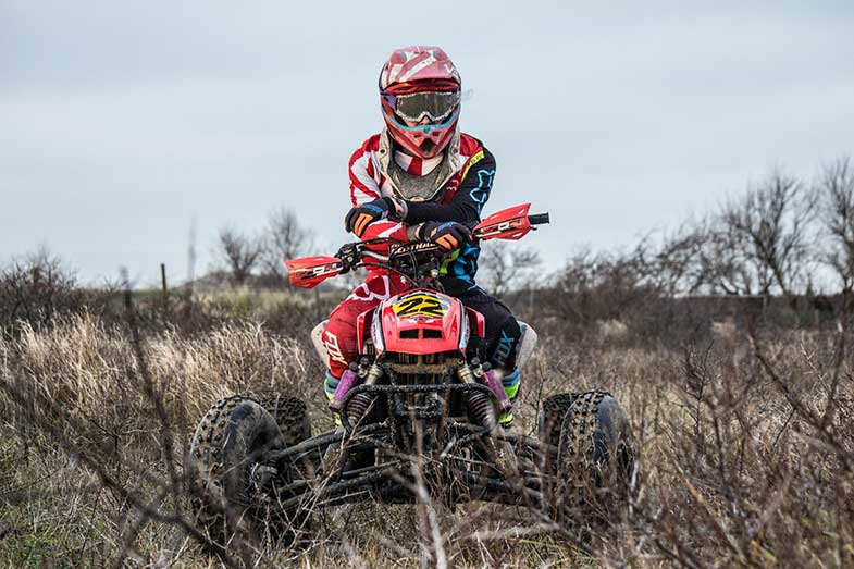 ATV Rider with Arms Crossed on Trail