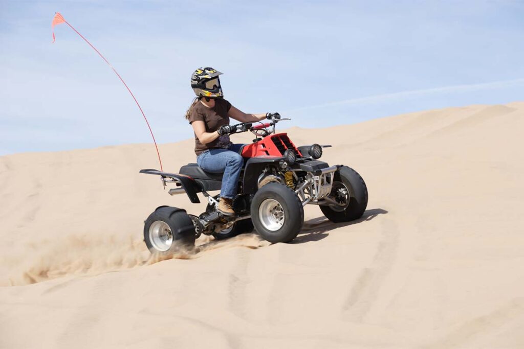 Quad Rider in Desert Sand