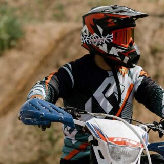 Dirt Bike Rider with Helmet and Goggles