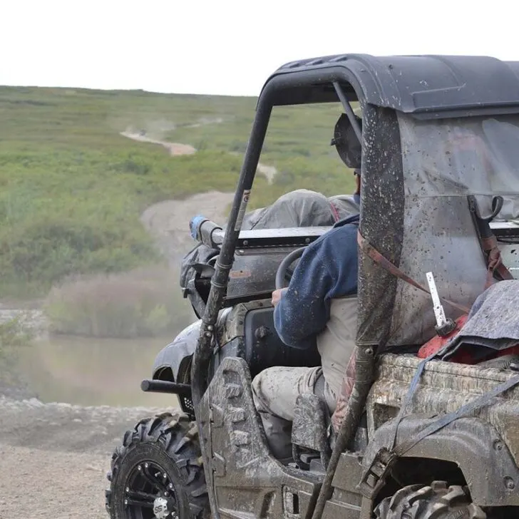 Muddy Off-Road Quad With Equipment