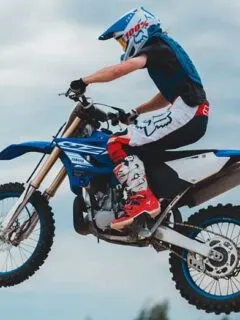 Blue Yamaha Dirt Bike Rider Jump