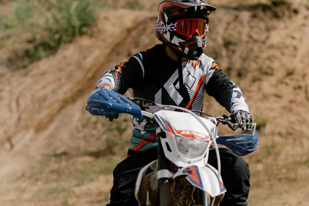 Person With Black Helmet Riding Motocross Bike