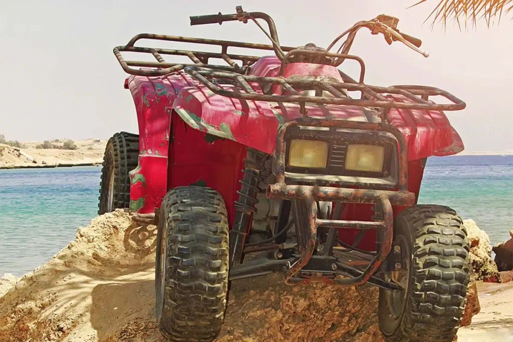 Red Quad Bike ATV on Rock