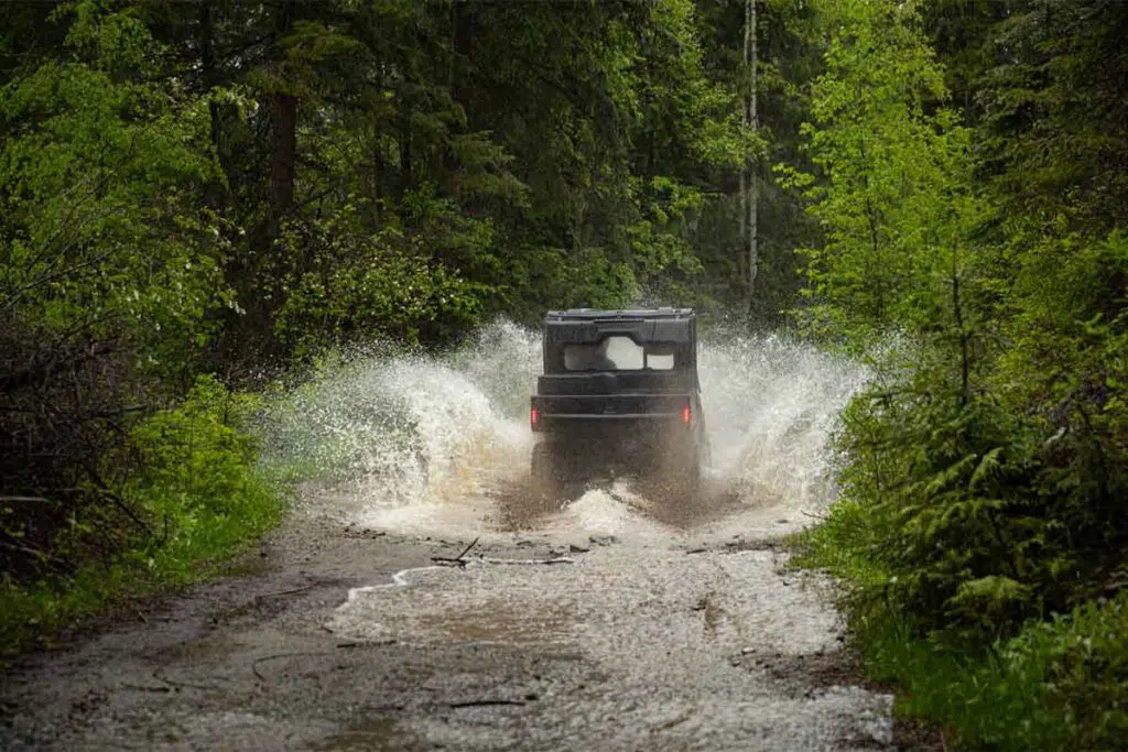 Off-Roading UTV Splashing Through Water