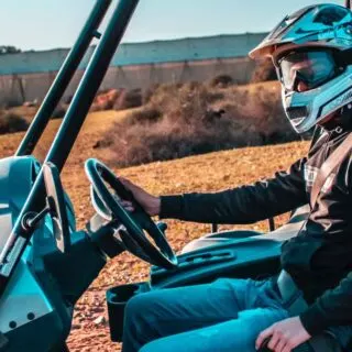 Person Riding UTV Side-By-Side