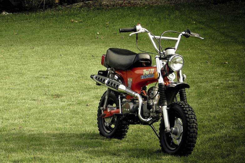 Red Honda Trail 70 Mini-Bike on Grass