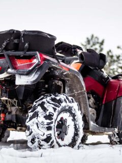 Big Red ATV With Equipment in the Snow