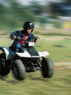 Quad ATV Going Fast