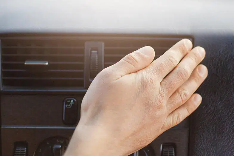 Hand on Car Heater