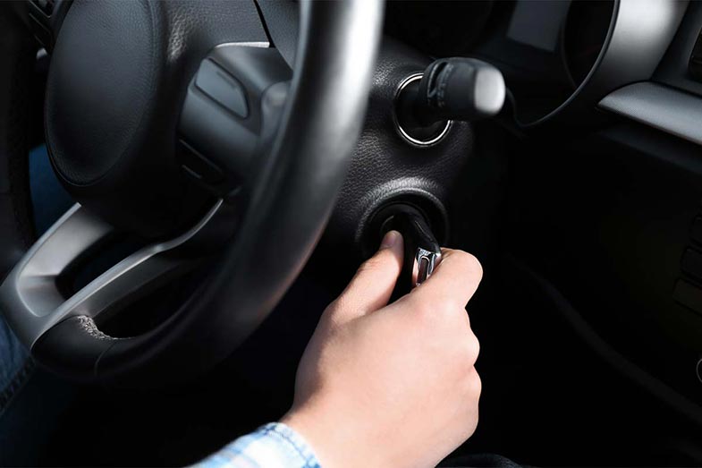 Driver Hand on Key in Ignition