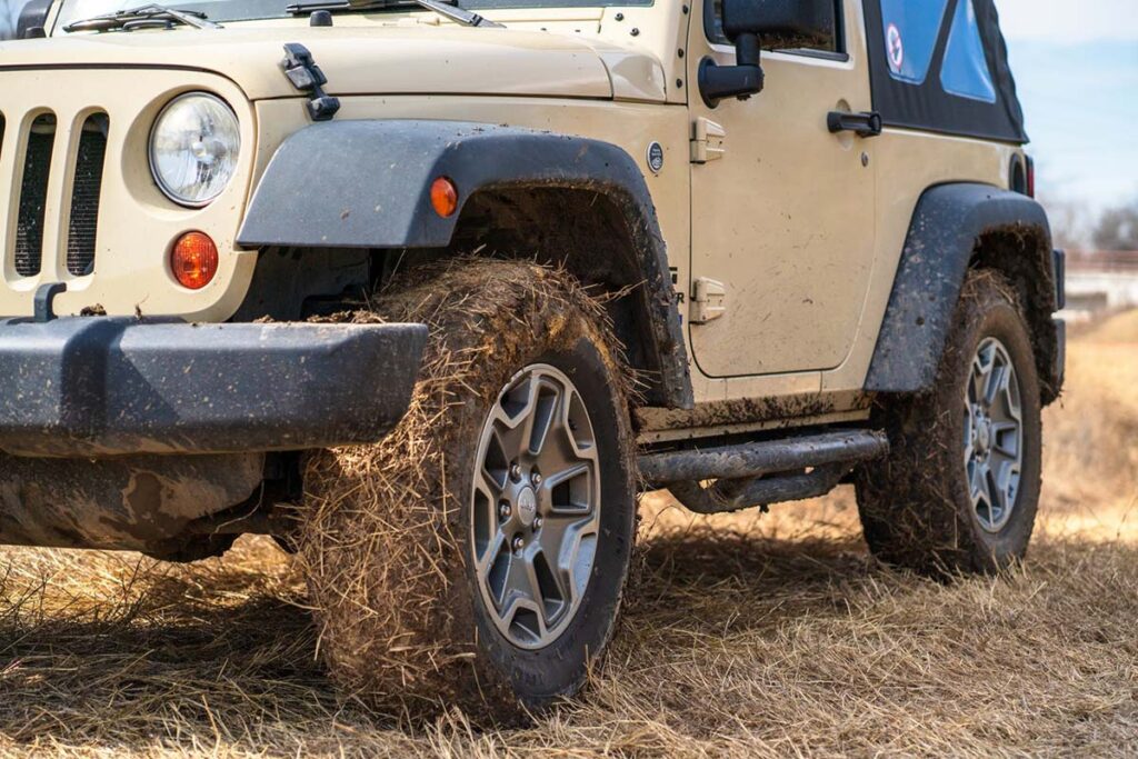 Jeep Wrangler Parked on a Grass Field