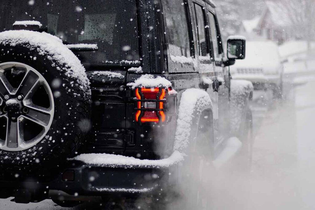 Black Jeep in Winter Snow