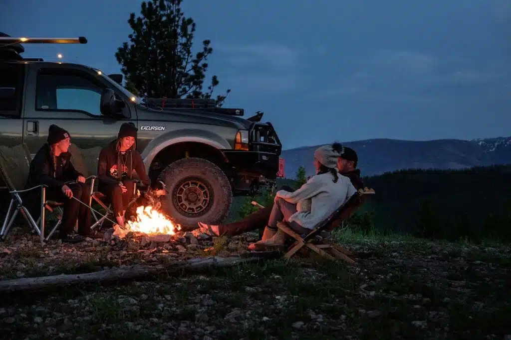 Friends Sitting Around a Campfire