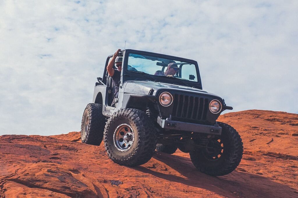Jeep Wrangler Off-Roading on Rocky Surface