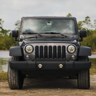 Black Jeep Wrangler Parked by Lake