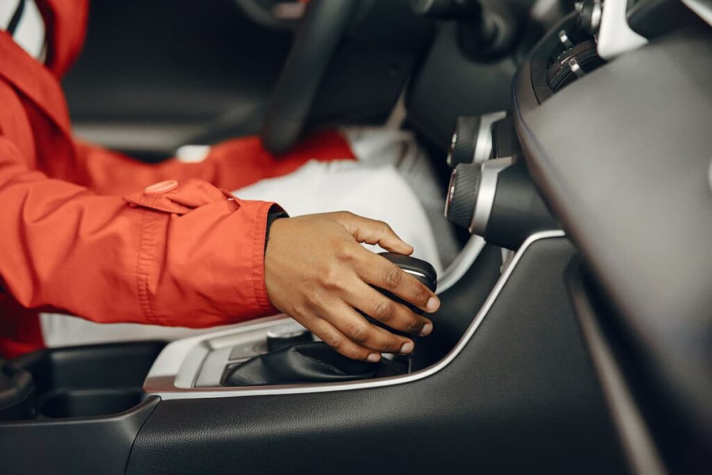 Person Operating Car Gearshift