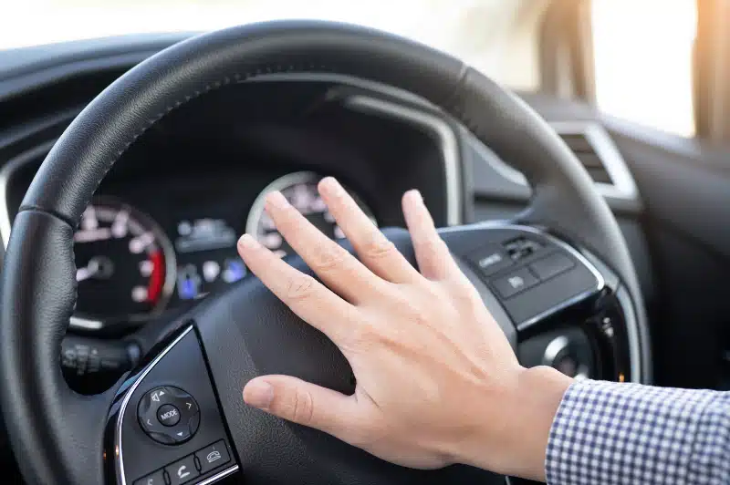 Person Pressing Car Horn