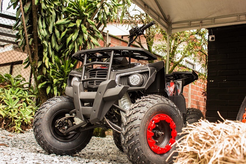 ATV With Large Wheels Under Cover