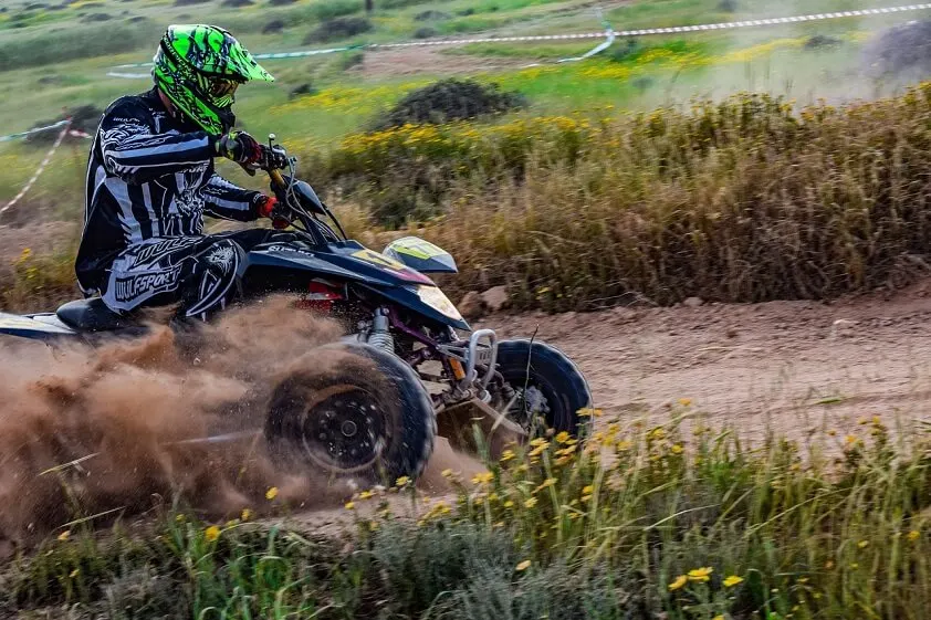ATV Quad Riding on Dusty Track
