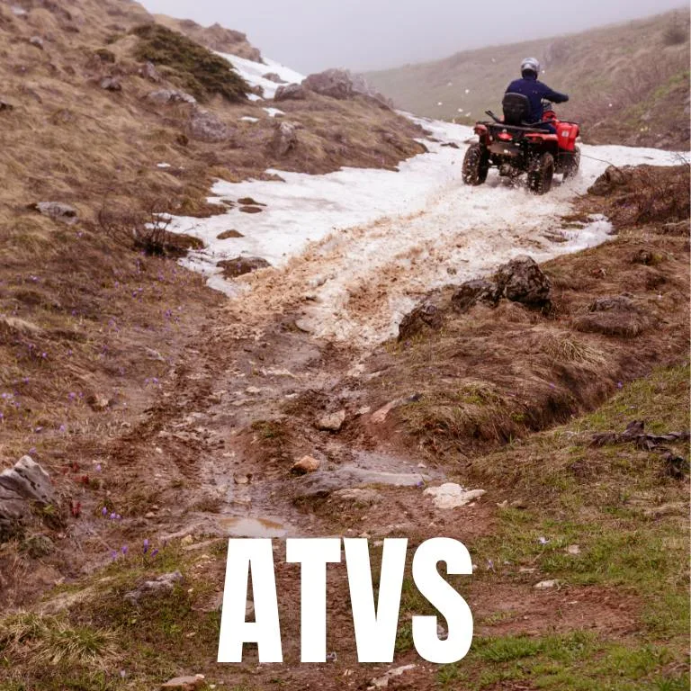 ATV Riding on Snow and Mud