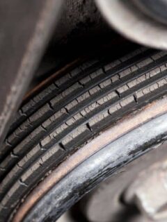 Cracked Serpentine Belt on Vehicle Engine Pulley