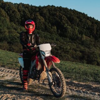 Dirt Bike Rider With Red Helmet