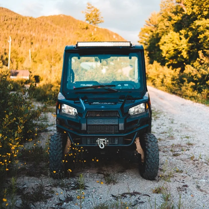 Polaris Ranger UTV Parked Near Forest