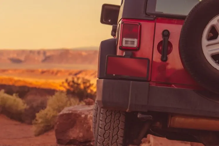 Red Jeep During Sunset
